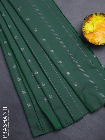 Arani semi silk saree dual shade of dark green with silver zari woven buttas in borderless style
