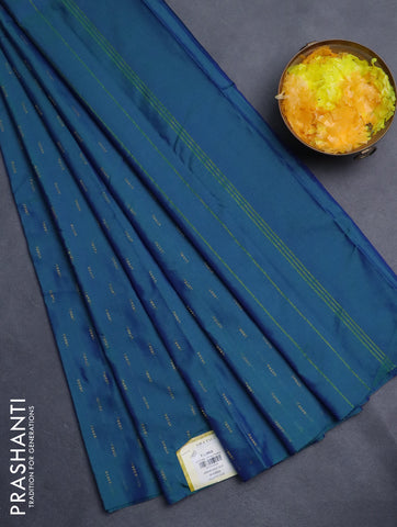 Arani semi silk saree dual shade of bluish green with zari woven buttas in borderless style