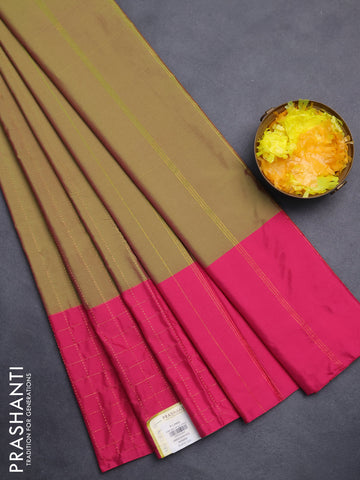 Arani semi silk saree dual shade of green and pink with allover copper zari weaves and zari checked border
