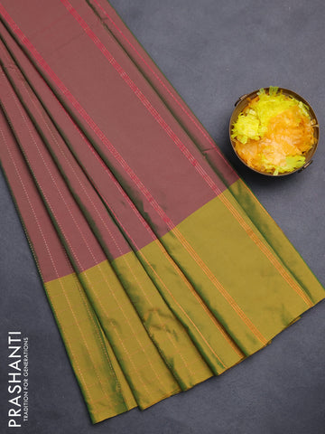 Arani semi silk saree dual shade of magenta pink and mustard green with allover copper zari weaves and zari checked border