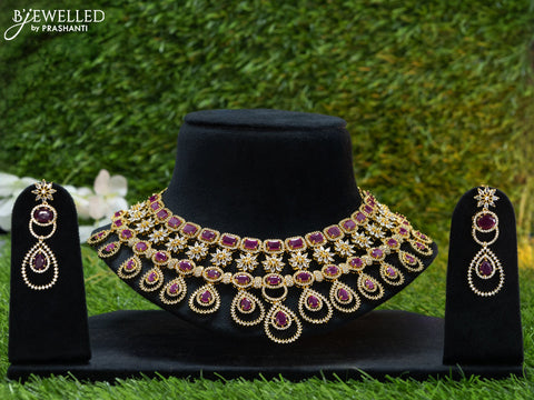 Zircon choker floral design with ruby and cz stones in gold finish
