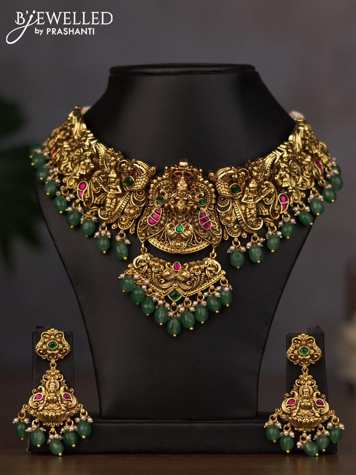 Antique necklace lakshmi design with jadau stones and green beads hanging