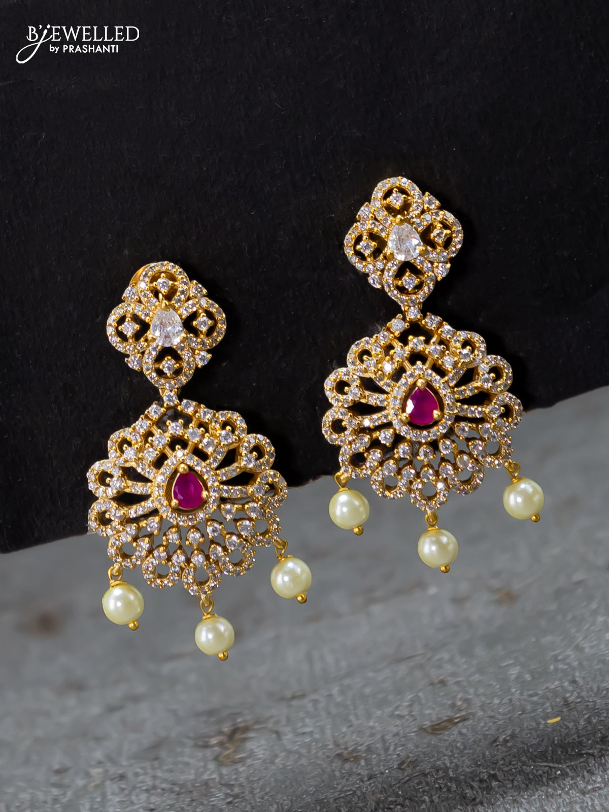 Gold Finish Ruby Red Stone Jhumka Earrings Design by Saga Jewels at  Pernia's Pop Up Shop 2024