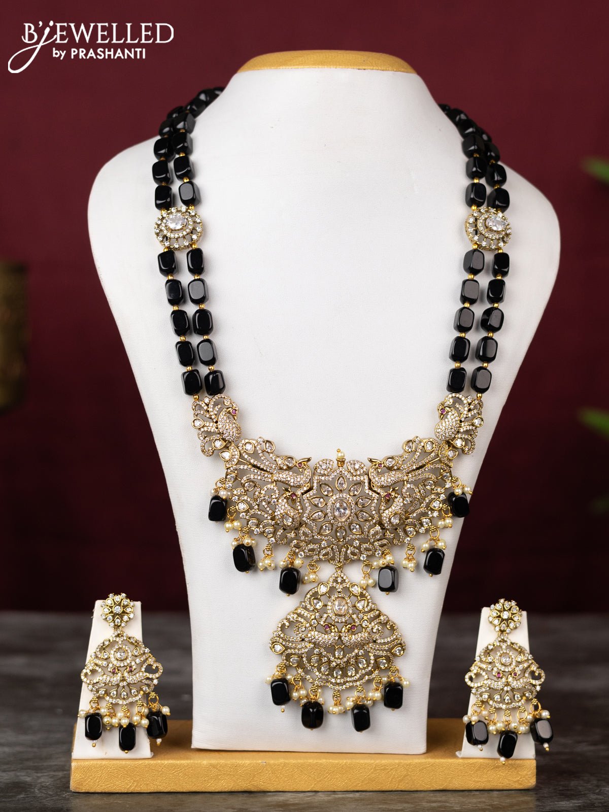 Beaded double layer black haram peacock design with cz stones and pearl & beads hangings in victorian finish