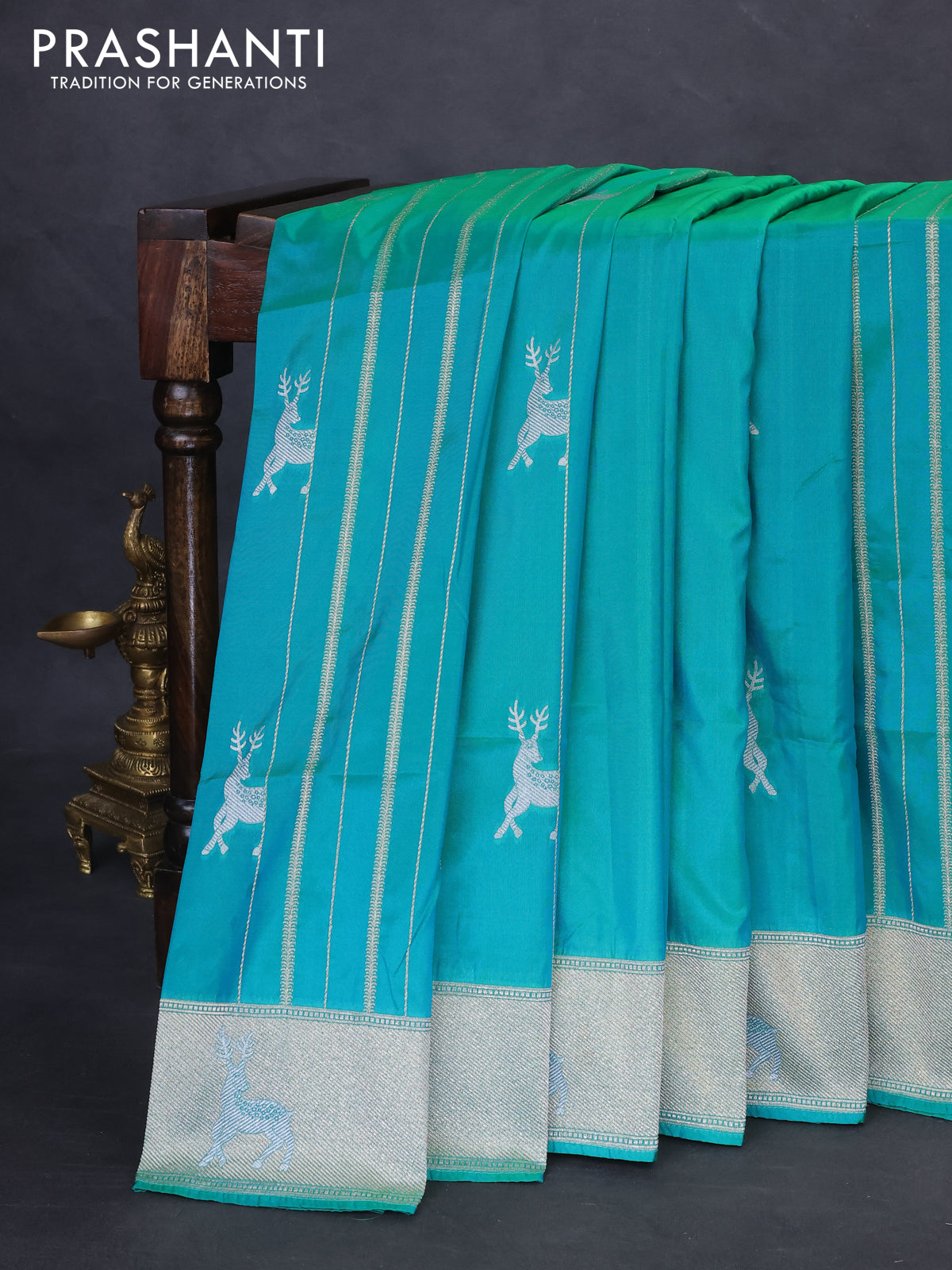 Banarasi semi katan silk saree teal green with allover silver & gold zari weaves and deer design zari woven border