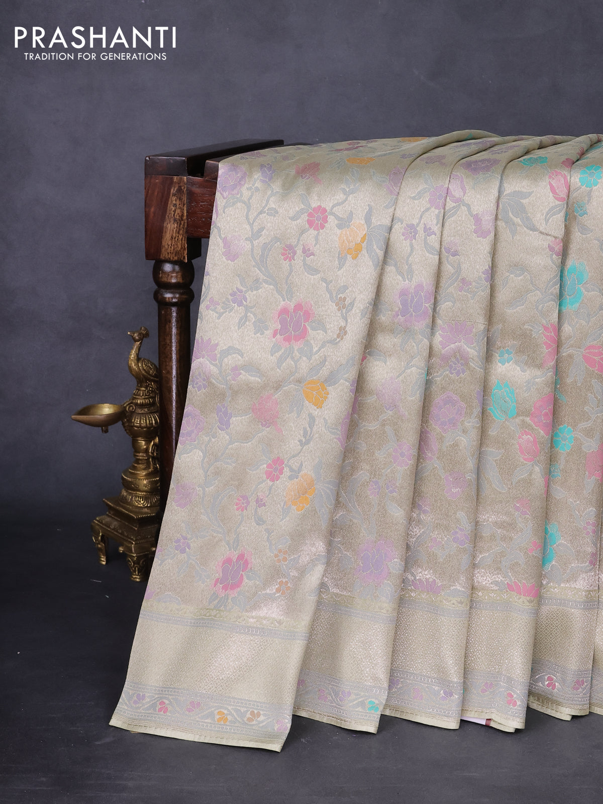 Banarasi tissue silk saree mild pista green with allover thread woven floral weaves and silver zari woven border