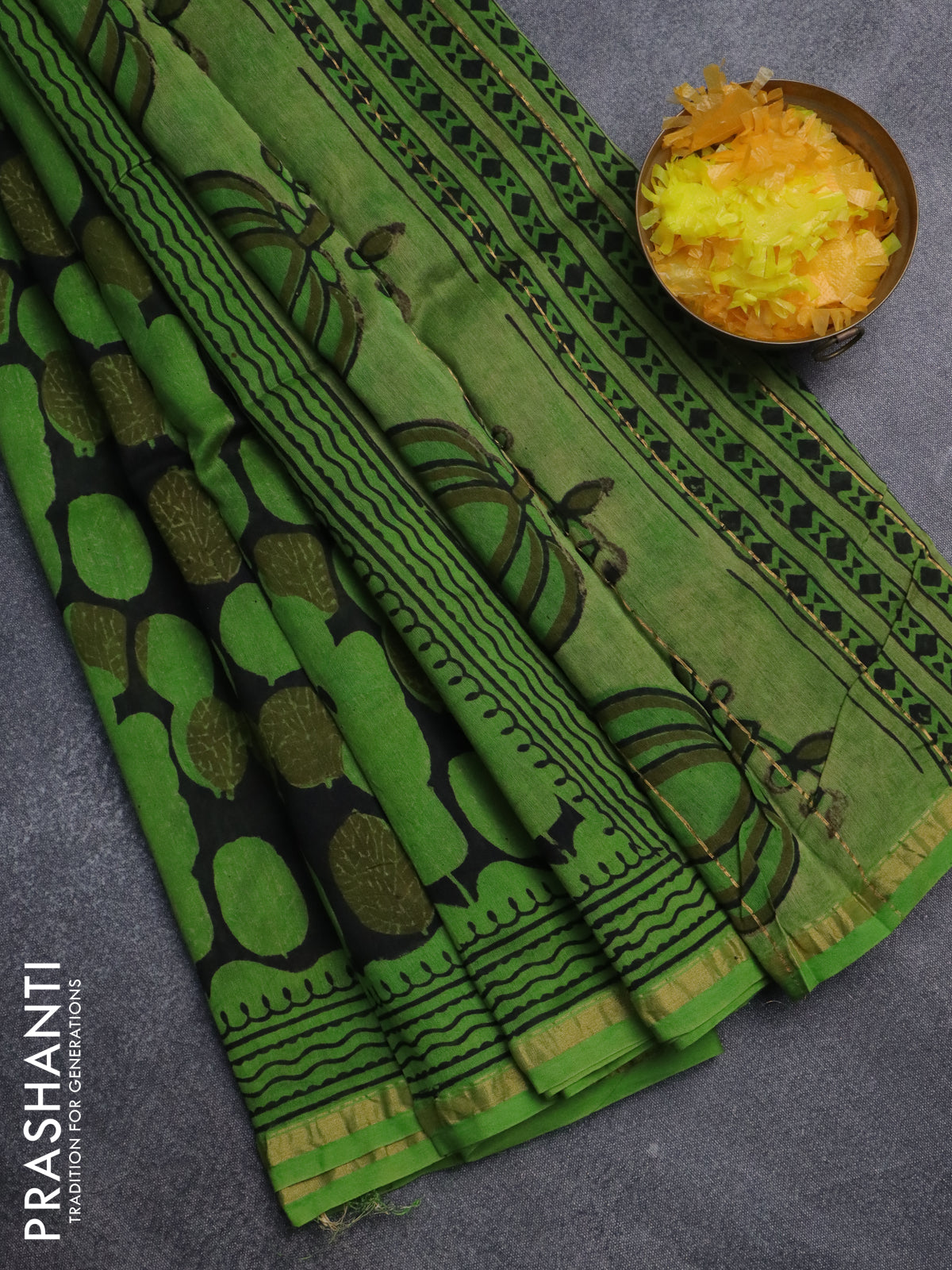 Chanderi bagru saree black and green with allover prints and small zari woven border