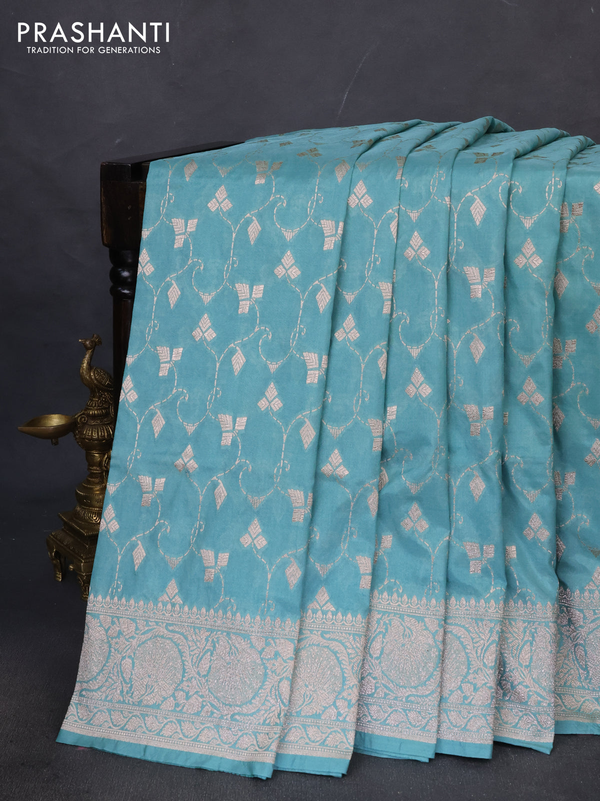 Banarasi semi katan saree teal blue with allover zari weaves and zari woven border