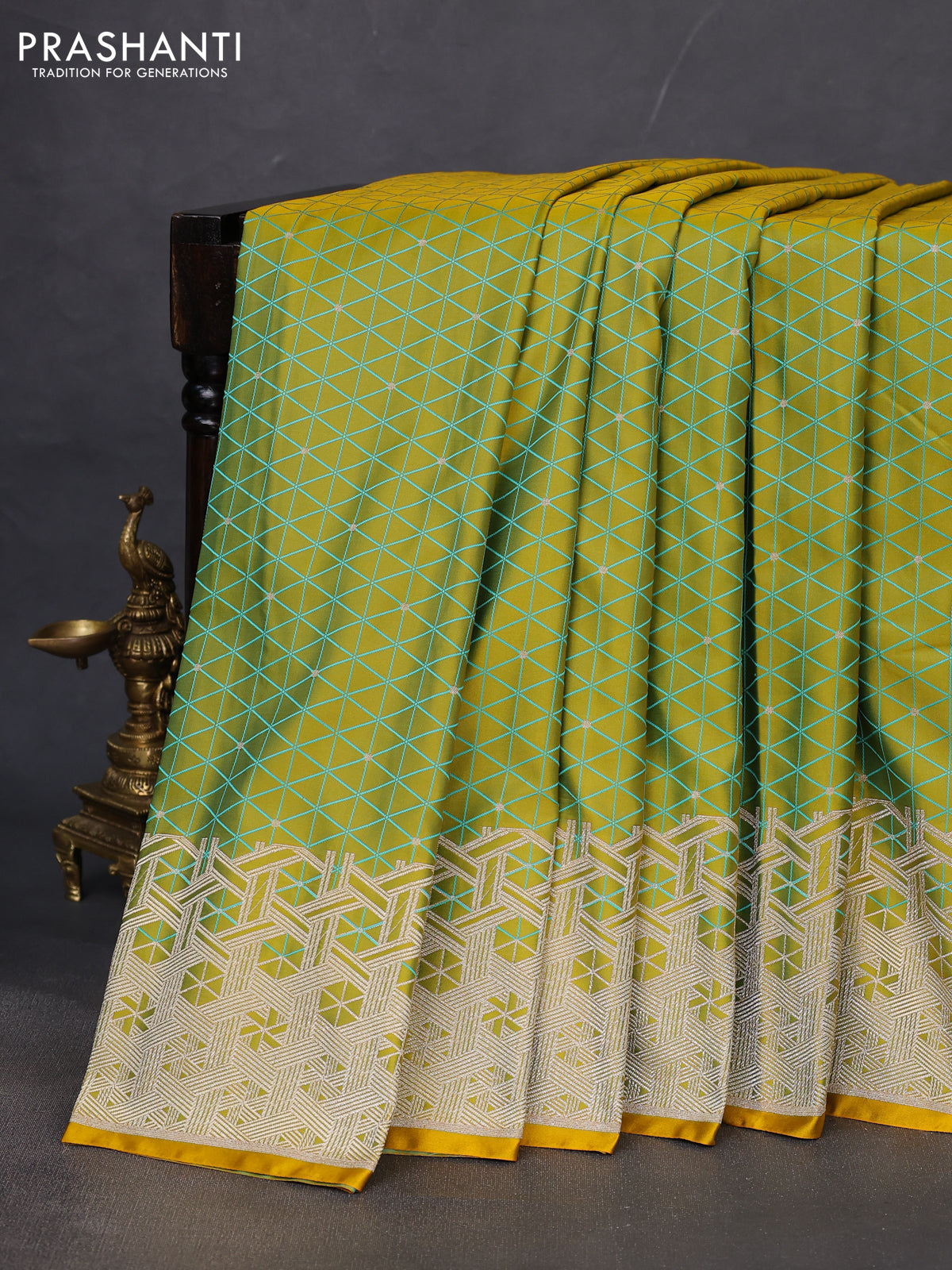 Banarasi semi mushru silk saree dual shade of mustard yellow and teal blue with allover self emboss & zari buttas and zari woven border