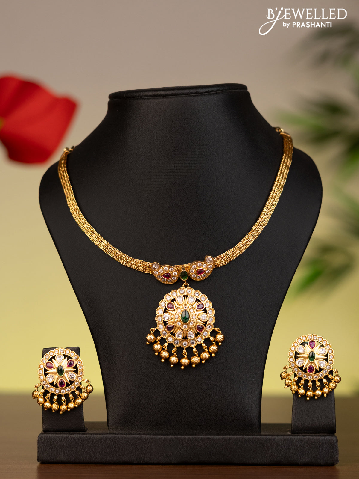 Antique attigai necklace with kemp stones and golden beads hanging