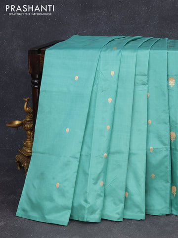 Banarasi katan silk saree teal green with zari woven buttas in borderless style