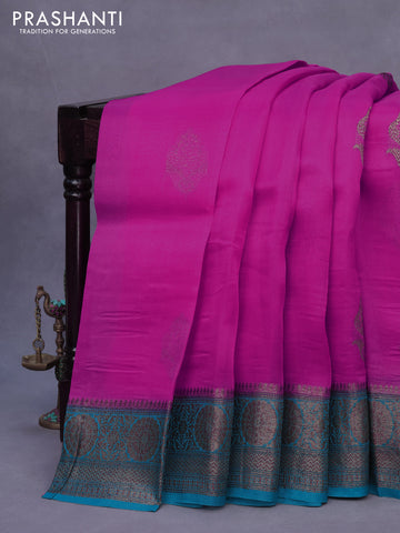 Banarasi organza silk saree pink and teal green with thread & zari woven buttas and banarasi style border