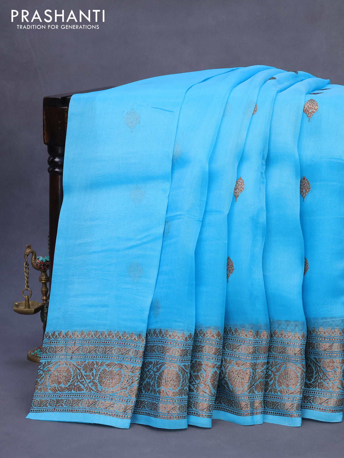 Banarasi organza silk saree teal blue with thread & zari woven buttas and banarasi style border