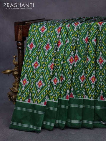 Pochampally silk saree dark green with allover ikat weaves and simple border