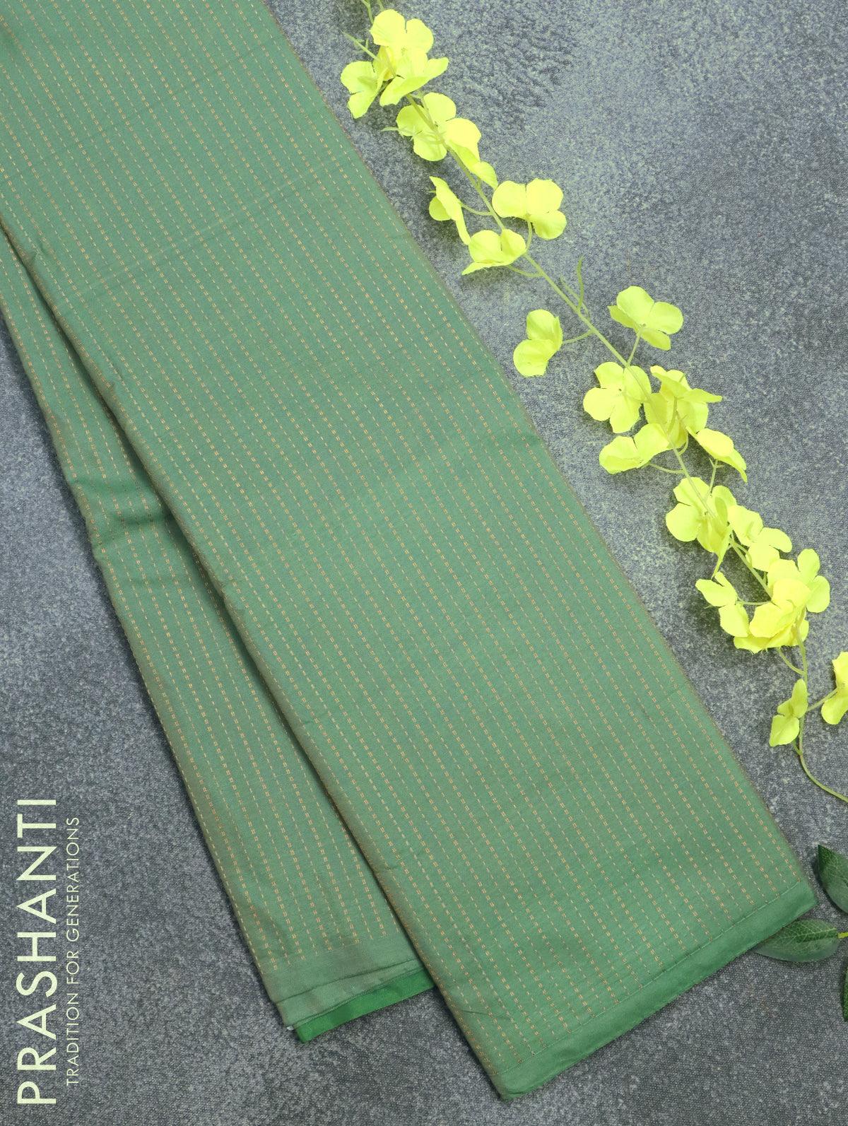 Arani semi silk saree green shade with allover copper zari weaves in borderless style