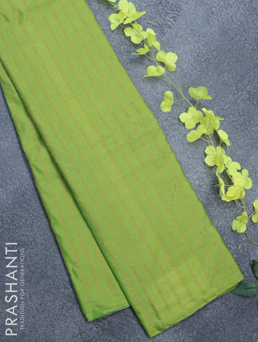 Arani semi silk saree light green with allover copper zari weaves in borderless style