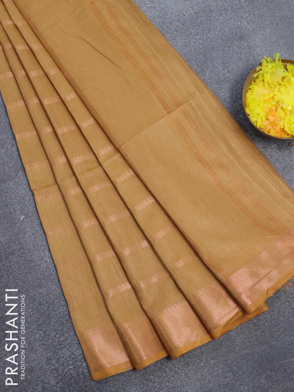 Bamboo silk saree mustard yellow with allover copper zari weaves and copper zari woven border