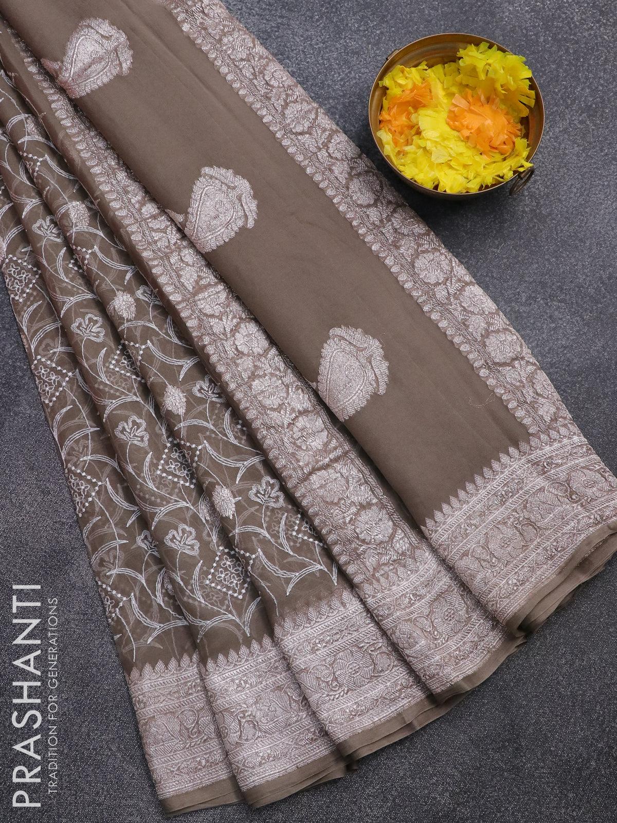 Banarasi chiffon saree grey shade   with allover chikankari work and silver zari woven border