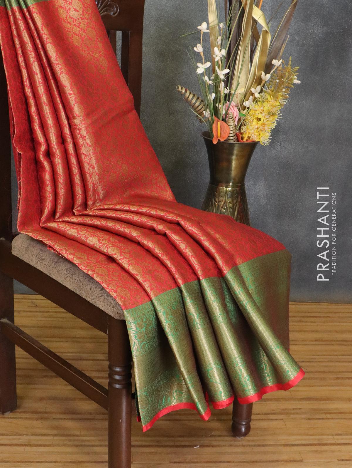 Banarasi kora saree red and green with allover zari weaves and long zari woven border