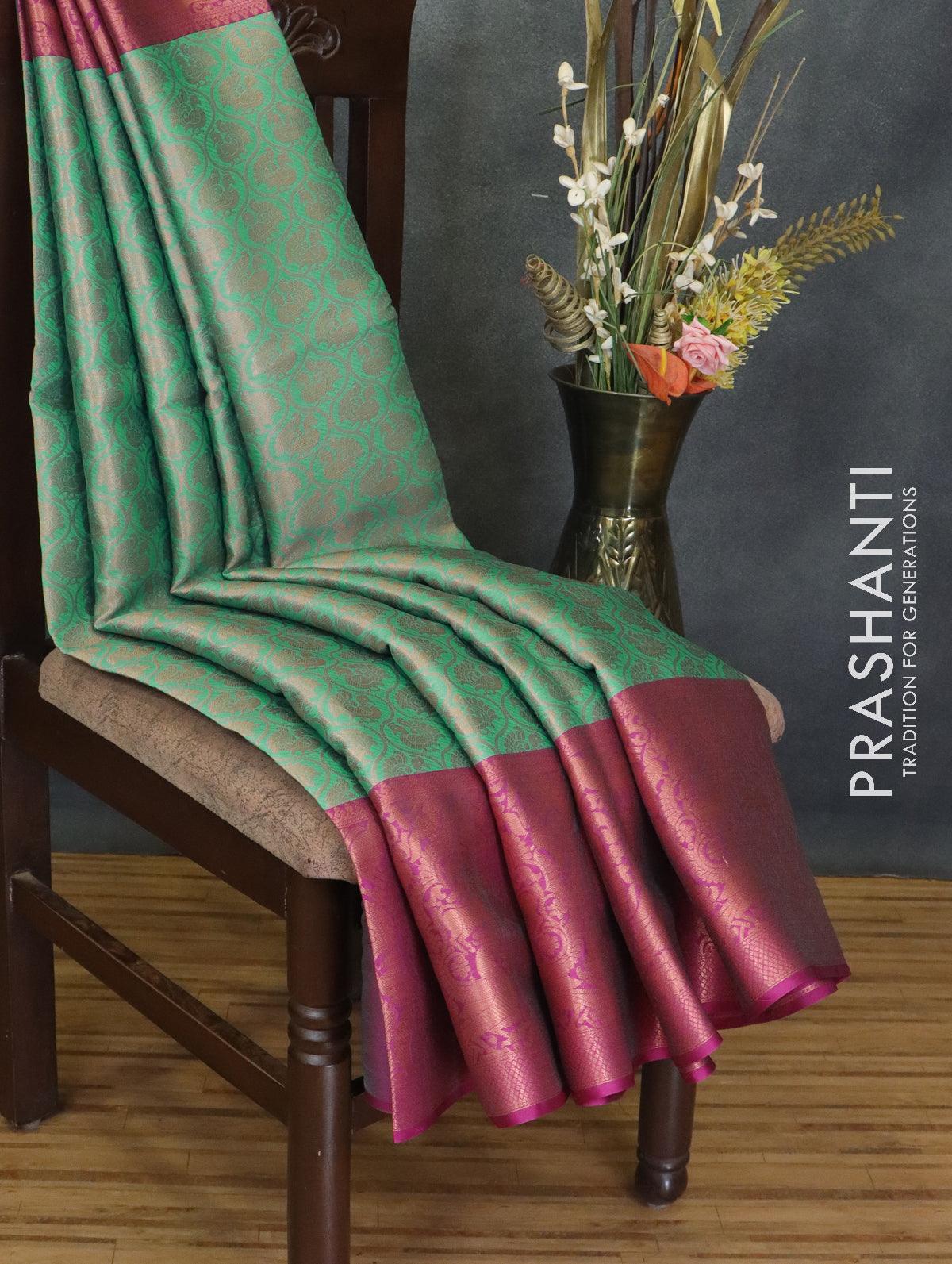 Banarasi kora saree teal green and magenta pink with allover annam copper zari weaves and long copper zari woven border