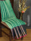 Banarasi kora saree teal green and pink with allover zari weaves and long floral zari woven border