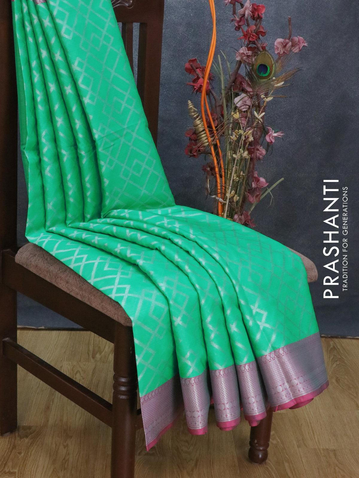 Banarasi kora saree teal green and purple with allover zari weaves and long rich zari woven border