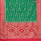 Banarasi semi katan saree teal green and reddish pink with allover floral zari weaves and zari woven border