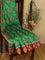 Bhagalpuri saree green and red with allover ikat prints and simple zari border