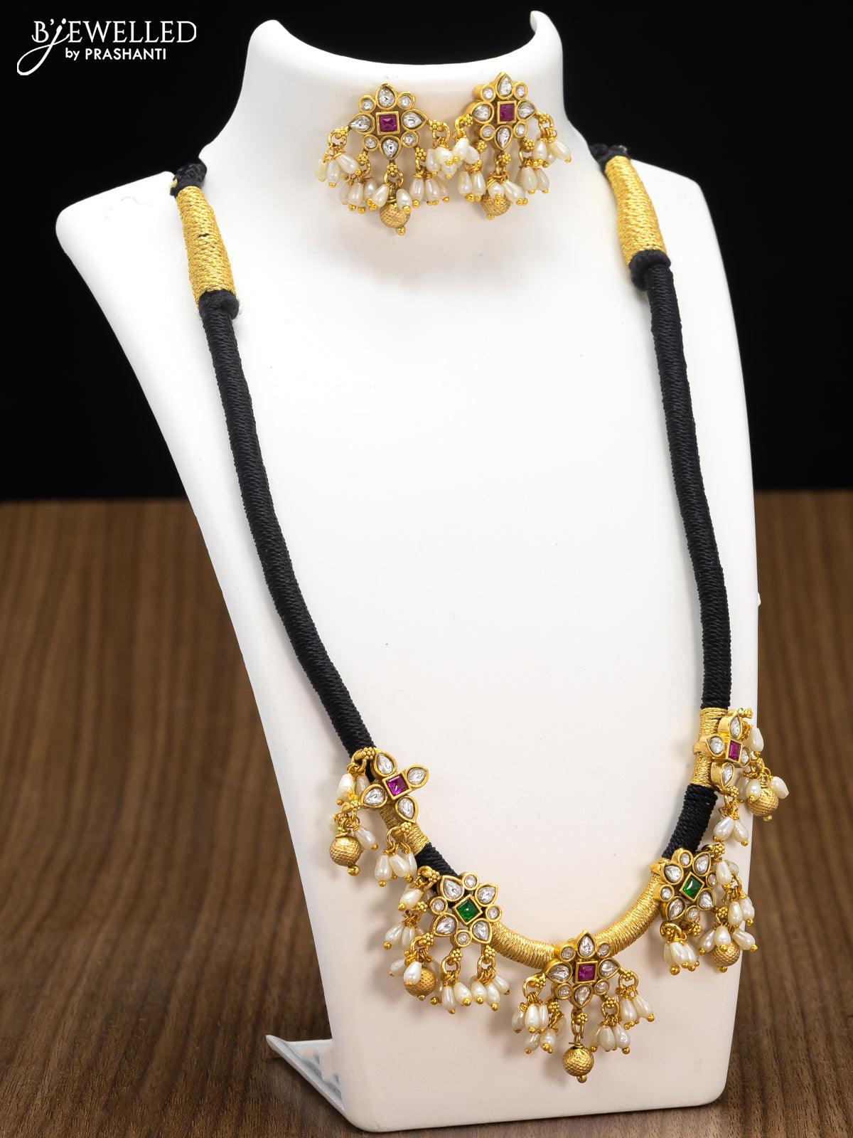 Necklace with hot sale black thread