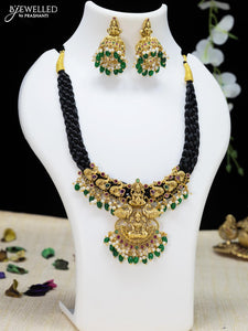 Lakshmi pendant with black on sale beads