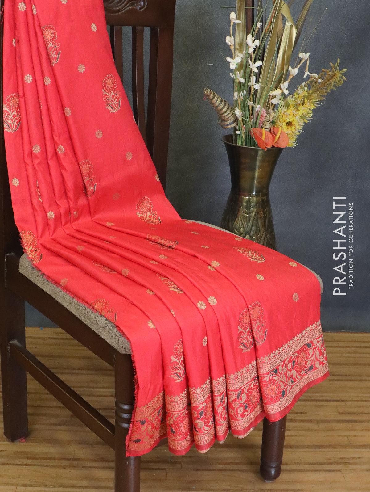 Grey printed artificial silk features lotus vine & pichwai cow  motifs,contrast traditional zari border & intricate pallu