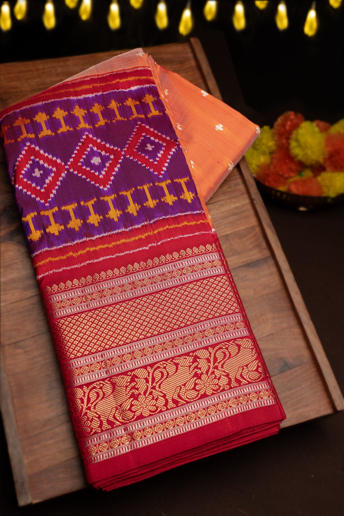 Mandir Coral & Purple Kanchi Ikat Ikat Saree