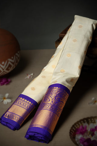 Varamahalakshmi Cream & Royal Blue Gadwal Buttis Saree