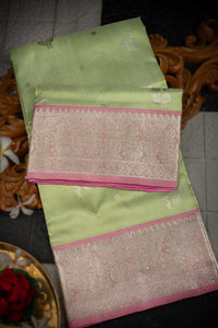 Varamahalakshmi Pista Green & Light Pink Venkatagiri Buttis Saree